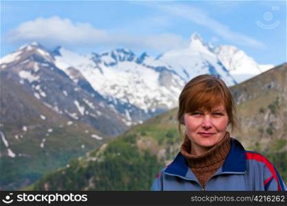 Summer Alps mountain (view from Grossglockner High Alpine Road) and woman portrait.
