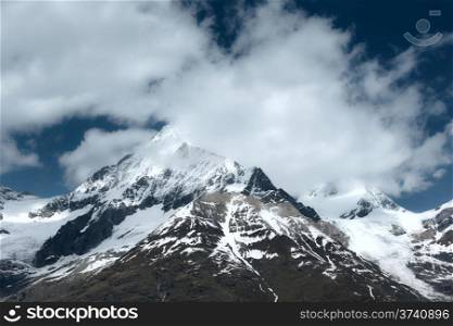 Summer Alps mountain view from plateau (Switzerland, near Zermatt)