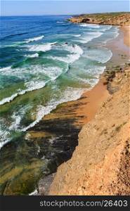 Summer Atlantic ocean coast landscape and Monte Clerigo beach (Aljezur, Algarve, Portugal).