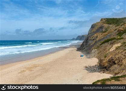 Summer Atlantic ocean coastline landscape (Cordoama beach, Algarve, Portugal).