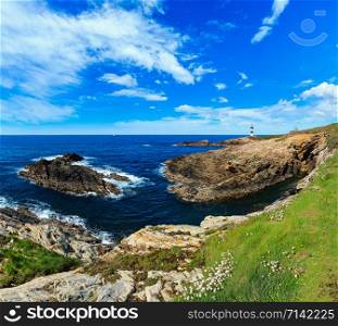 Summer Atlantic ocean coastline landscape (island Pancha with lighthouse), Spain. Two shots stitch panorama.