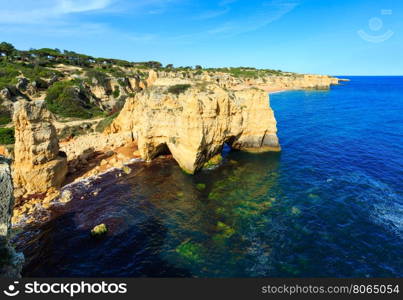 Summer Atlantic rocky coast top view (Albufeira outskirts, Algarve, Portugal).