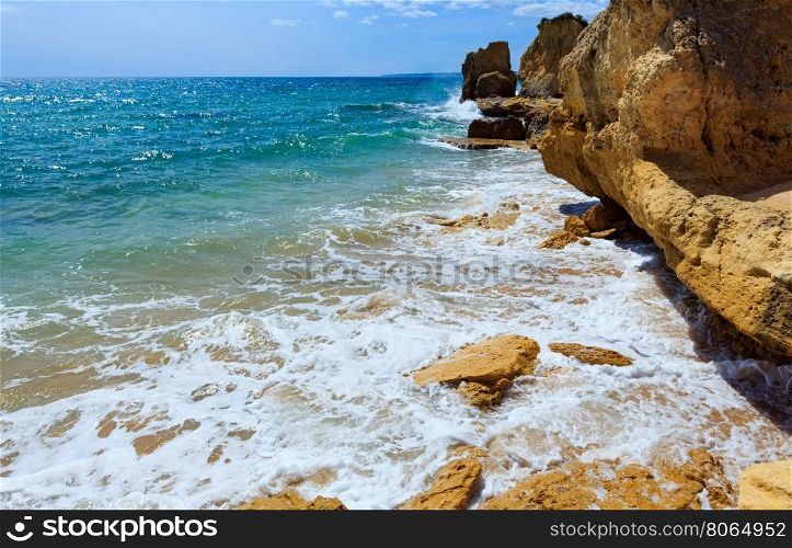 Summer Atlantic rocky coast view (Albufeira outskirts, Algarve, Portugal).