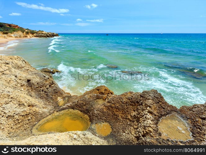 Summer Atlantic rocky coast view (Albufeira outskirts, Algarve, Portugal).