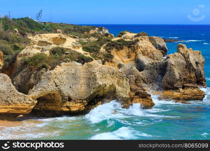 Summer Atlantic rocky coast view (Albufeira outskirts, Algarve, Portugal).