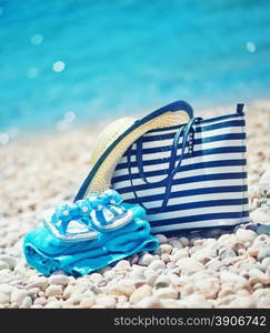 summer background, blue towel on sea beach