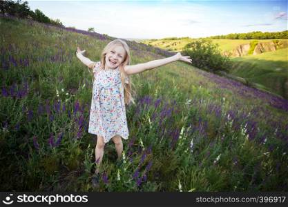 summer - beautiful happy smiling girl on a meadow