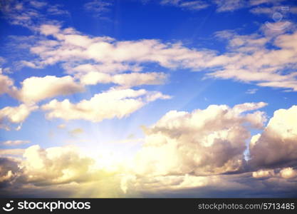 summer blue sky with sun and clouds