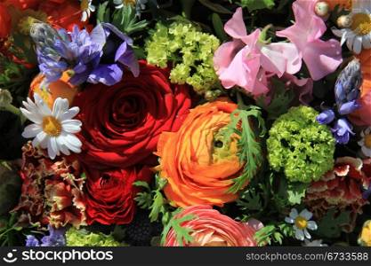 Summer bouquet with various flowers in different bright colors