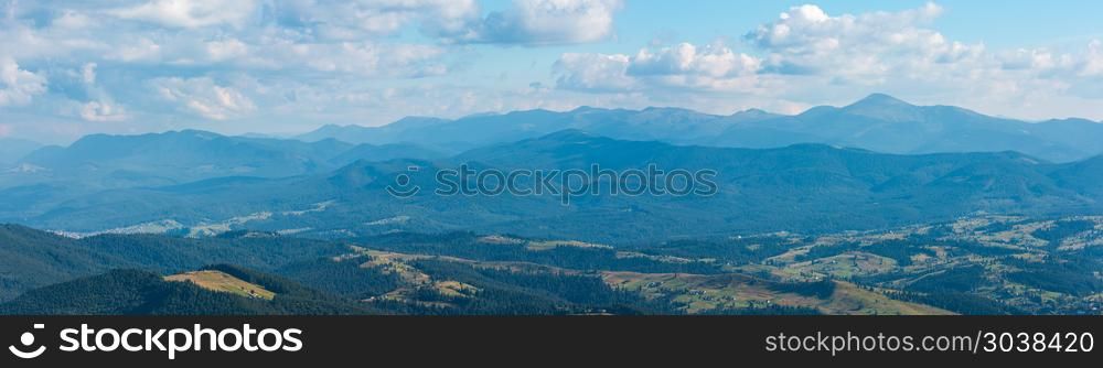 Summer Carpathian mountain top view from stony summit of Homiak Mount (Gorgany, Ukraine). Three shots stitch high-resolution panorama.. Summer Carpathian mountain view