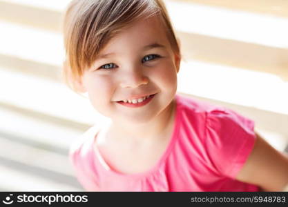 summer, childhood, happiness and people concept - happy beautiful little girl portrait