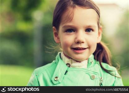 summer, childhood, happiness and people concept - happy beautiful little girl portrait outdoors