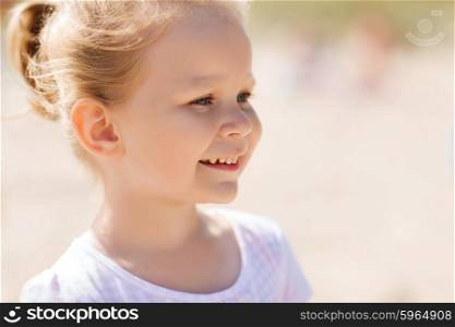 summer, childhood, happiness and people concept - happy beautiful little girl portrait outdoors