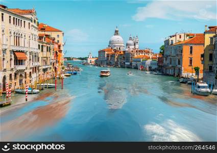 Summer cityscape of Venice with the view on basilica in Grand Canal