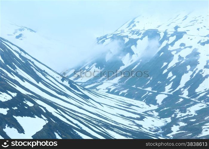 Summer cloudy mountain landscape (Oberalp Pass, Switzerland)