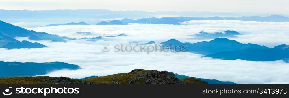 Summer cloudy mountain panorama view (Ukraine, Carpathian Mountains). Three shots stitch image.