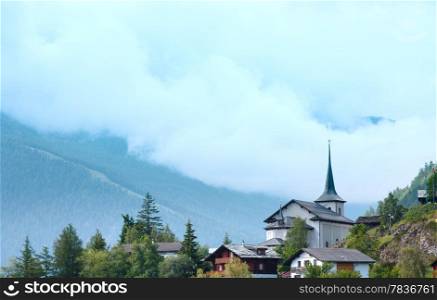 Summer cloudy mountain village landscape (Alps, Switzerland)