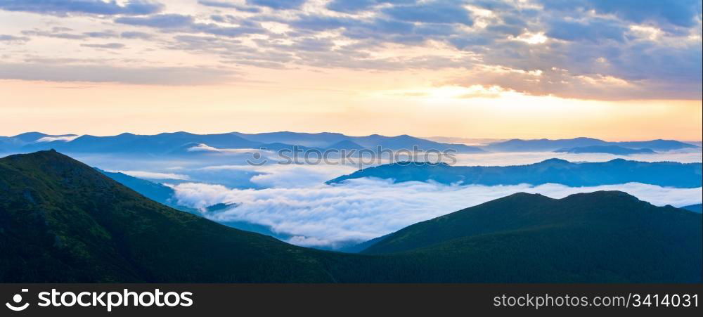 Summer cloudy sunrise mountain panorama view (Ukraine, Carpathian Mountains). Two shots stitch image.