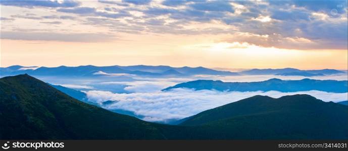 Summer cloudy sunrise mountain panorama view (Ukraine, Carpathian Mountains). Two shots stitch image.