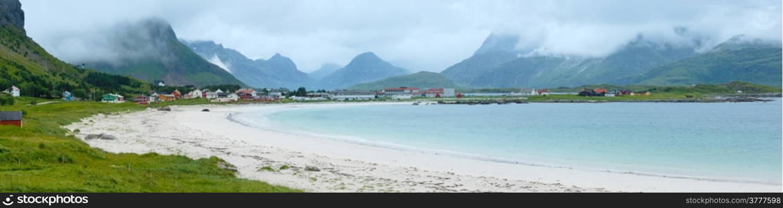 Summer cloudy view of the beach with white sand in Ramberg (Norway, Lofoten).