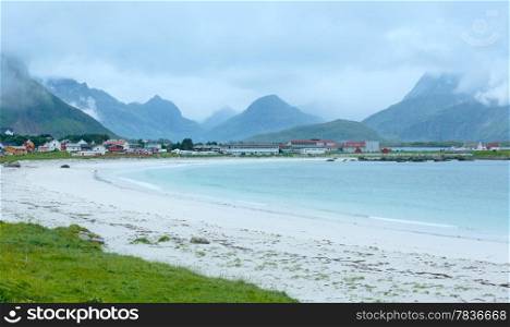 Summer cloudy view of the beach with white sand in Ramberg (Norway, Lofoten).