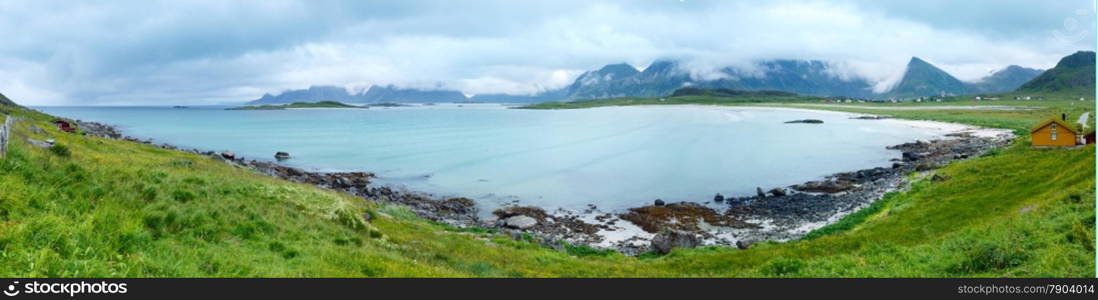 Summer cloudy view of the beach with white sand in Ramberg (Norway, Lofoten).