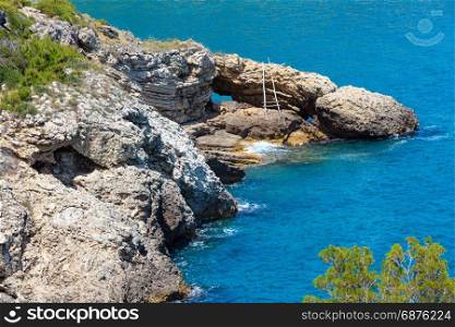 Summer coast near Architello (Arch) of San Felice on the Gargano peninsula in Puglia, Italy