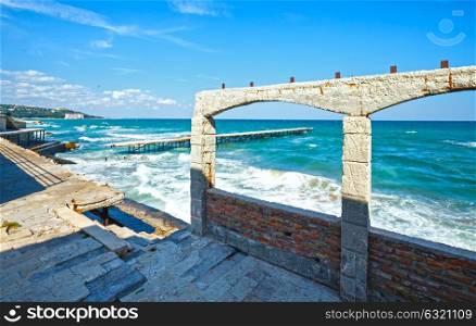 Summer coast view with ruined pier (Black Sea, Bulgaria, near Varna).
