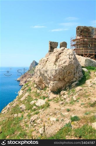 Summer coastline and view of ancient Genoese fortress (Near Balaclava Town, Crimea, Ukraine)