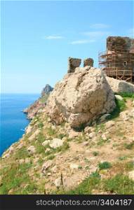 Summer coastline and view of ancient Genoese fortress (Near Balaclava Town, Crimea, Ukraine)