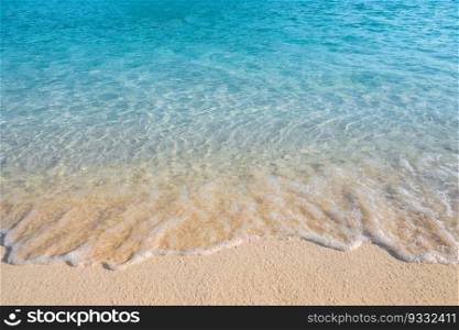 Summer concept ,Soft wave lapped the sandy beach background