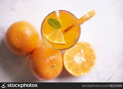 Summer drink juicy orange slice, Exotic summer drinks refreshing of cold drinks glasses fresh fruit on ice homemade cocktail tea with orange and mint leaf