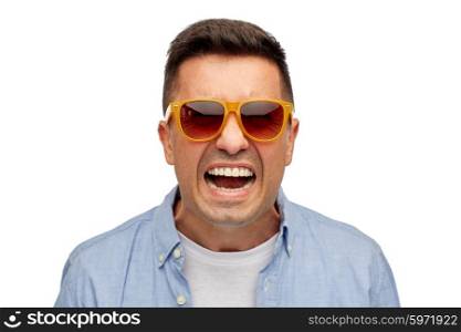 summer, emotions , style and people concept - face of angry middle aged latin man in shirt and sunglasses
