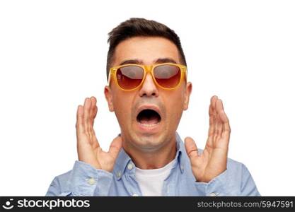 summer, emotions, style and people concept - face of scared middle aged latin man in shirt and sunglasses