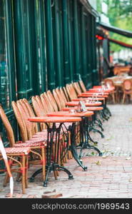 Summer empty open air cafe in european city. Summer empty open air restaraunt in Europe.