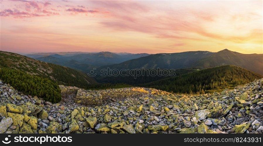 Summer evening Carpathian mountain stony slope panoramic view in last sunset sunlight. Vysoka Mountain, Gorgany Carpathian massive, Ukraine.
