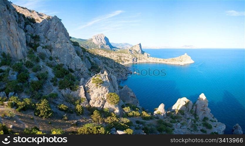 "Summer evening rocky coastline of "Novyj Svit" reserve (Crimea, Ukraine, "Capchik Cape" ). Three shots stitch image."