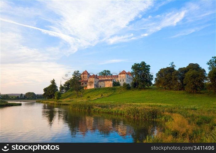 Summer evening view of Svirzh Castle (Lviv Oblast, Ukraine. Built in XV-XVII th century.)