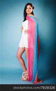 Summer fashion. Full length beauty young woman fashionable sensual girl with coloured shawl on blue background