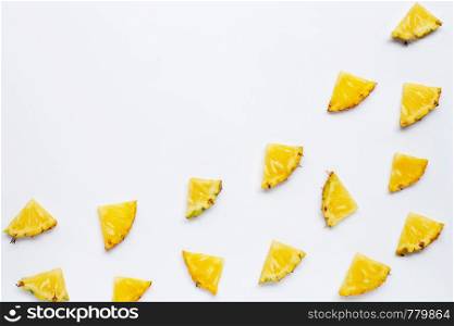 Summer fruit. Sliced pineapple on white background. Copy space