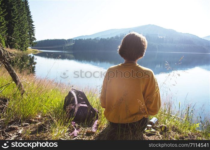 Summer - girl on a picnic by the lake. Lacul Vidra, Romania