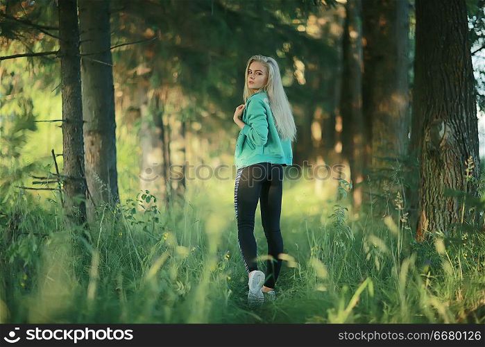 summer girl running nature / young adult athletic slender girl jogging, nature, freshness beauty summer