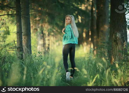 summer girl running nature / young adult athletic slender girl jogging, nature, freshness beauty summer