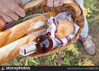 Summer - Girl with a basket goes on a picnic