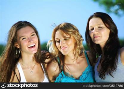 summer girlfriends in sun ligt happy and smile