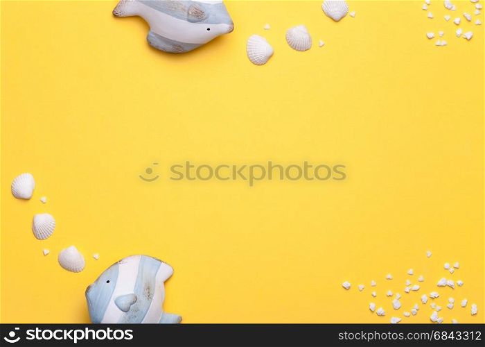 Summer holiday vacation background with fish and seashell. Copy space. Top view