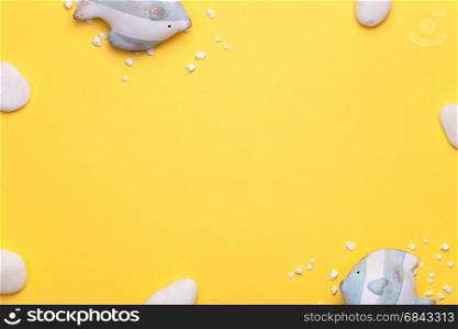 Summer holiday vacation background with fish and white stones. Copy space. Top view