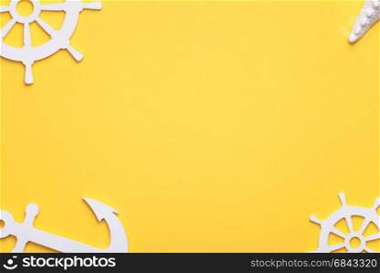 Summer holiday vacation background with starfish, anchor and rudders in white. Copy space. Top view
