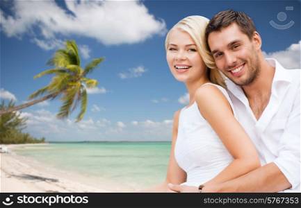 summer holiday, vacation, dating and tourism concept - happy couple having fun and hugging over beach background