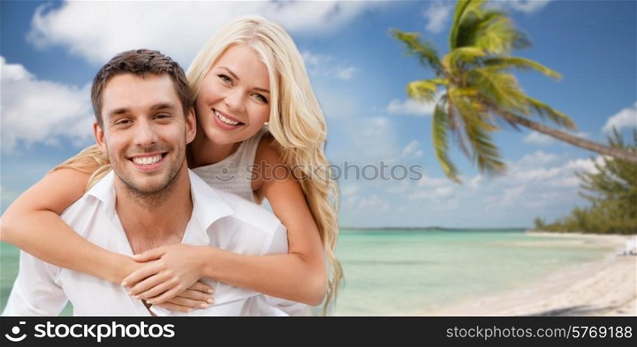 summer holiday, vacation, dating and tourism concept - happy couple having fun over tropical beach background